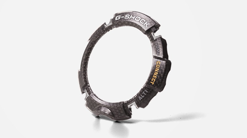 Carbon fibre inserted bezel