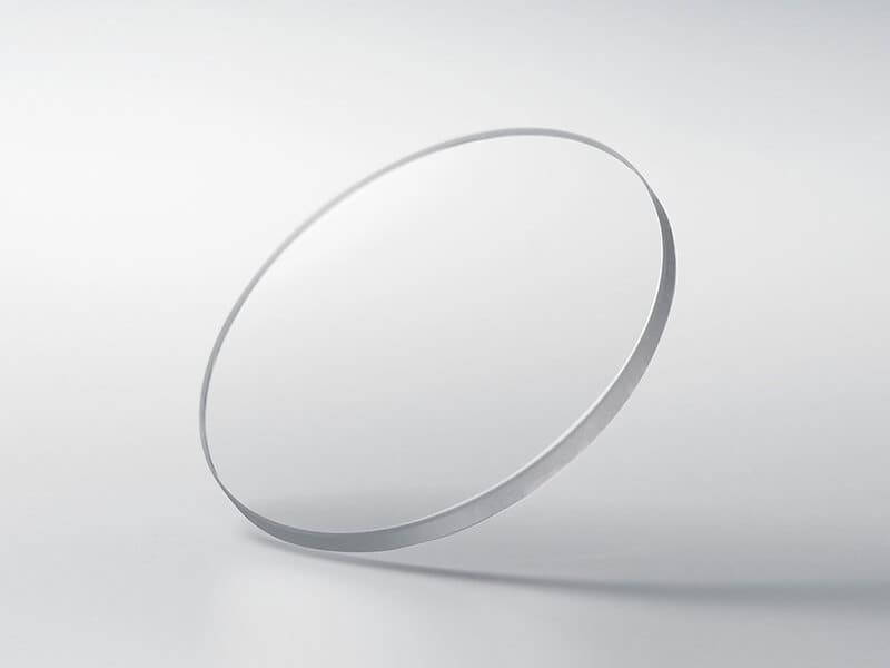 Scratch-resistant, highly transparent sapphire crystal with an anti-reflective coating